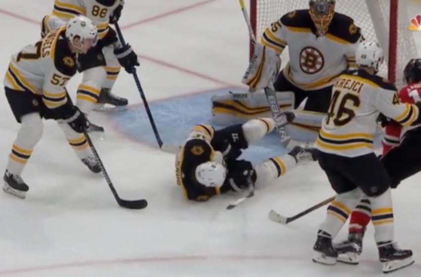 Krug takes a stick to the family jewels, goes down hard