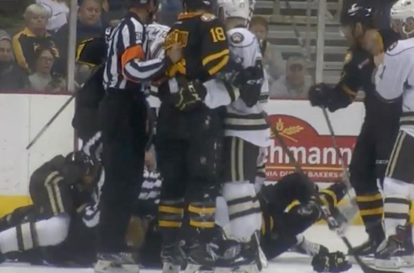 ICYMI: Massive hit causes line brawl that leads to epic goalie fight in the AHL